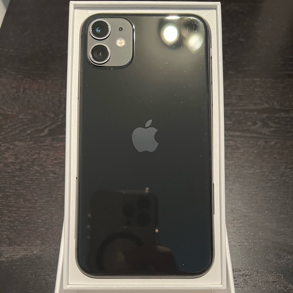 iPhone 11 two camera 128GB lightly used. Comes with charger in box . Looks new